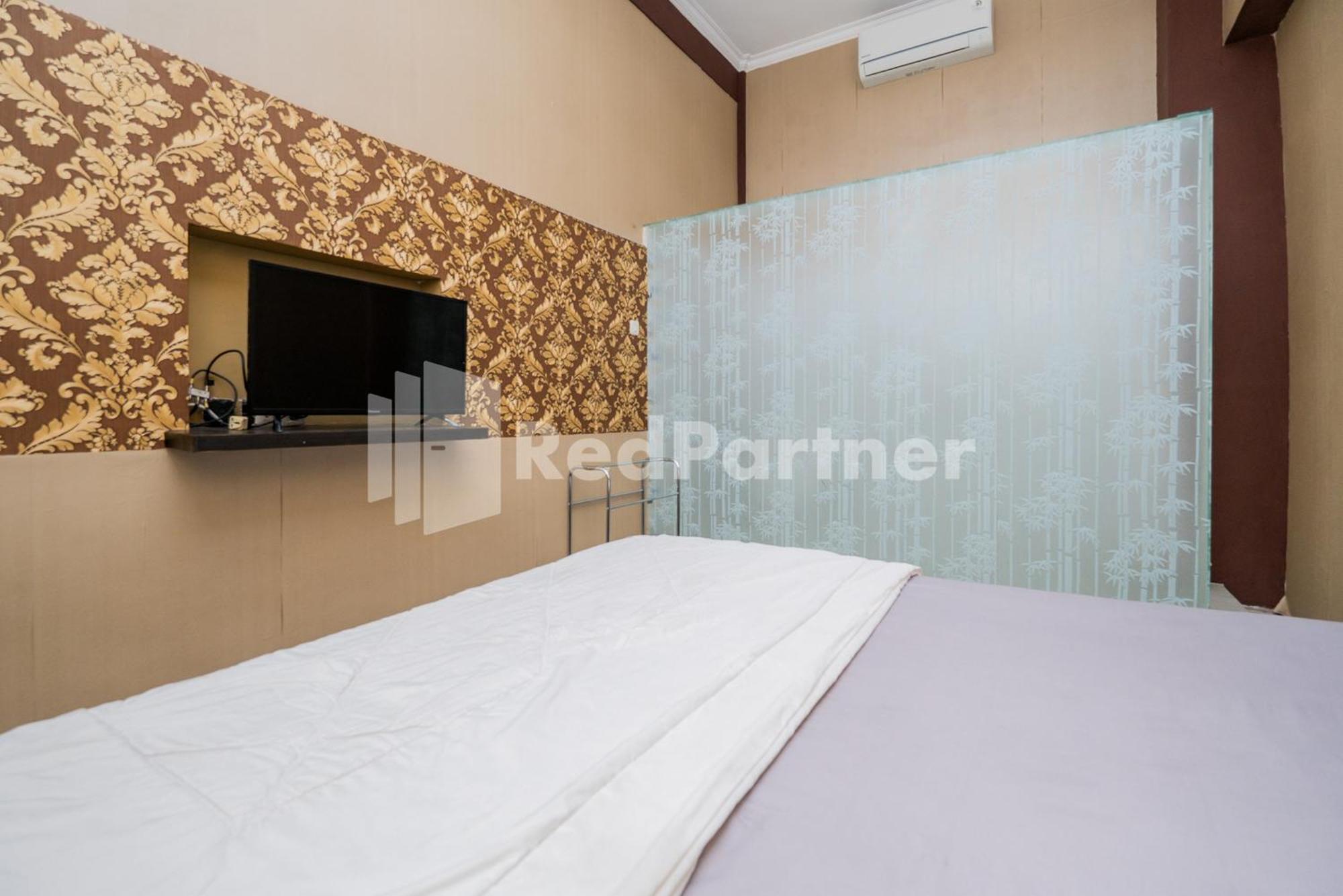 ホテル Omah Kalimosodo Mitra Reddoorz Near Stasiun Malang Kota Baru エクステリア 写真